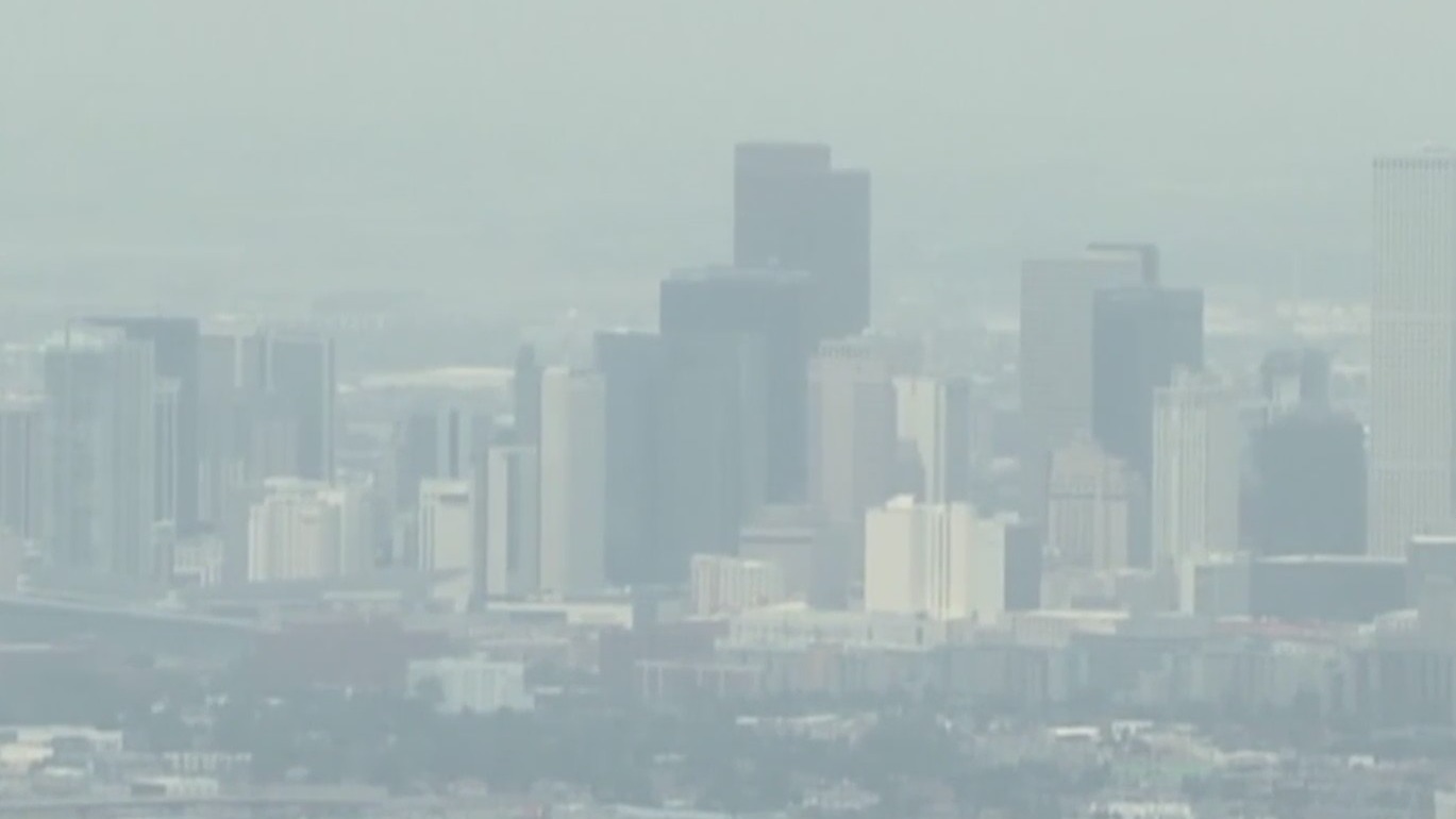 Downtown Denver skyline aerial view with haze fogging the view