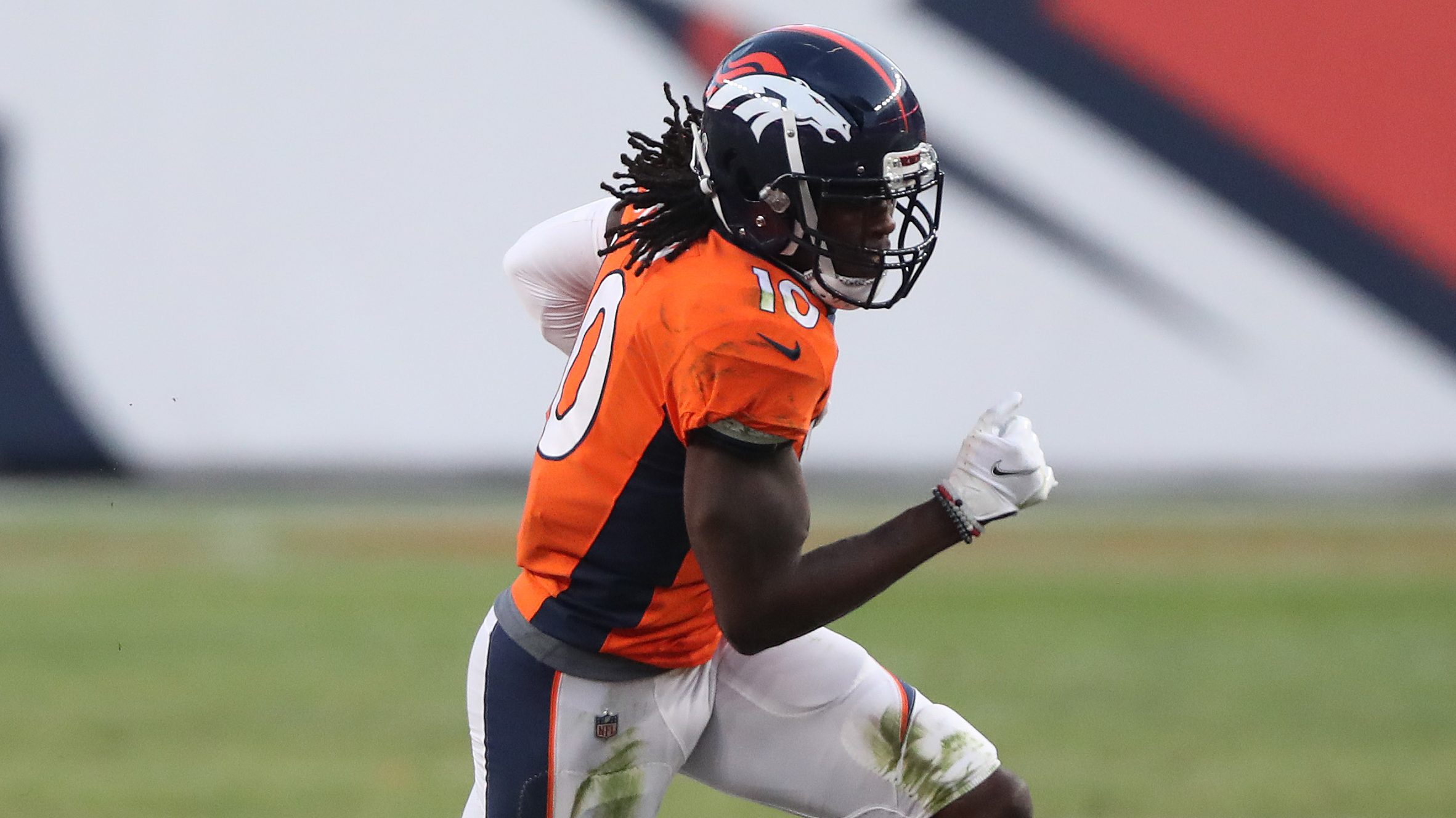 Jerry Jeudy #10 of the Denver Broncos carries the ball