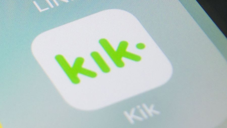 Kik app logo on phone