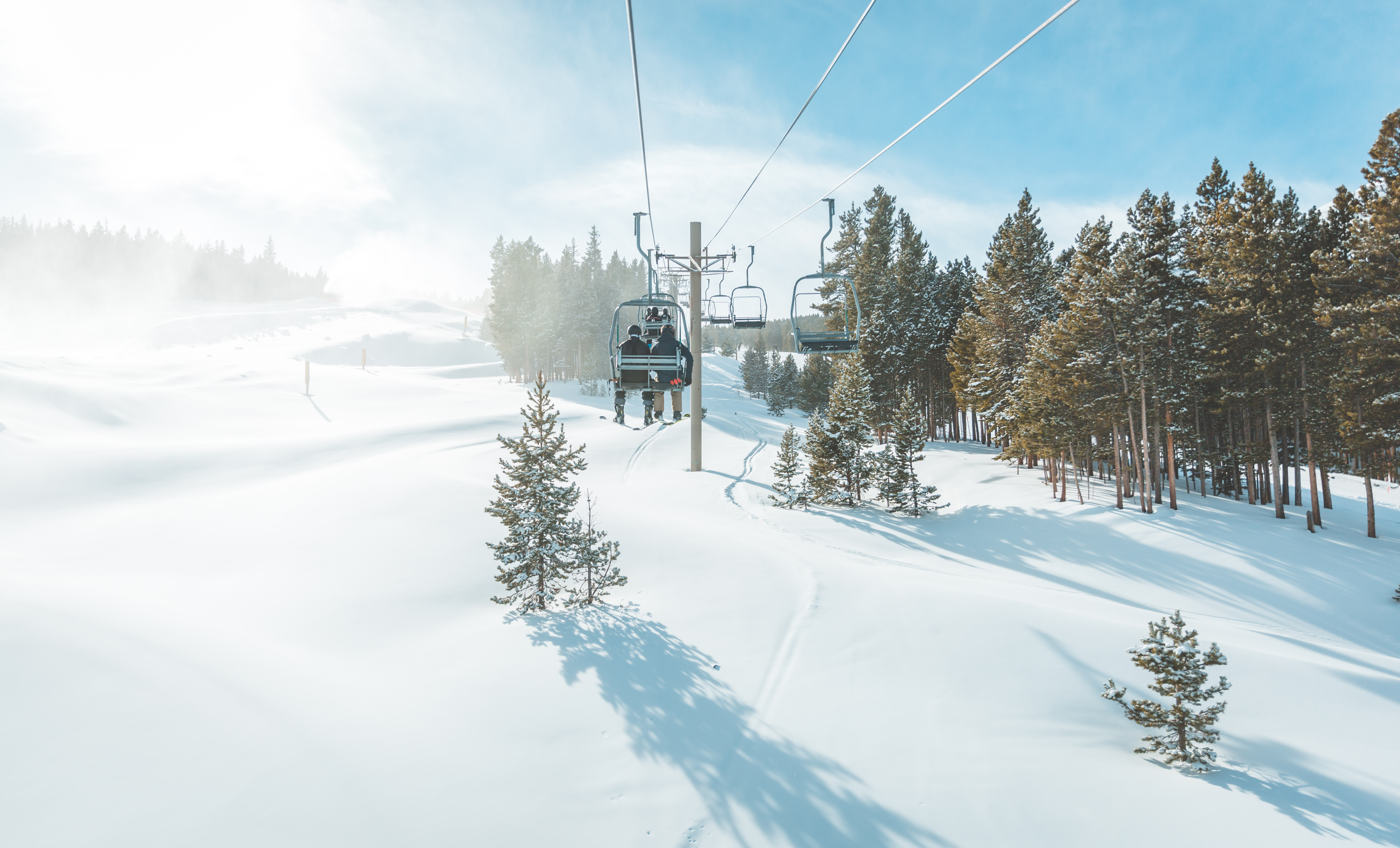 View of untracked ski slope and ski lift in Breckenridge ski resort.