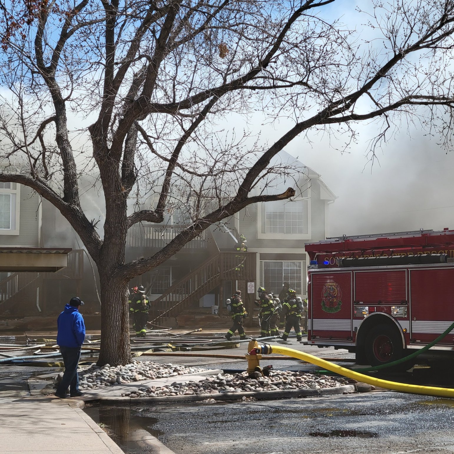 Crews battle southeast Denver townhome fire