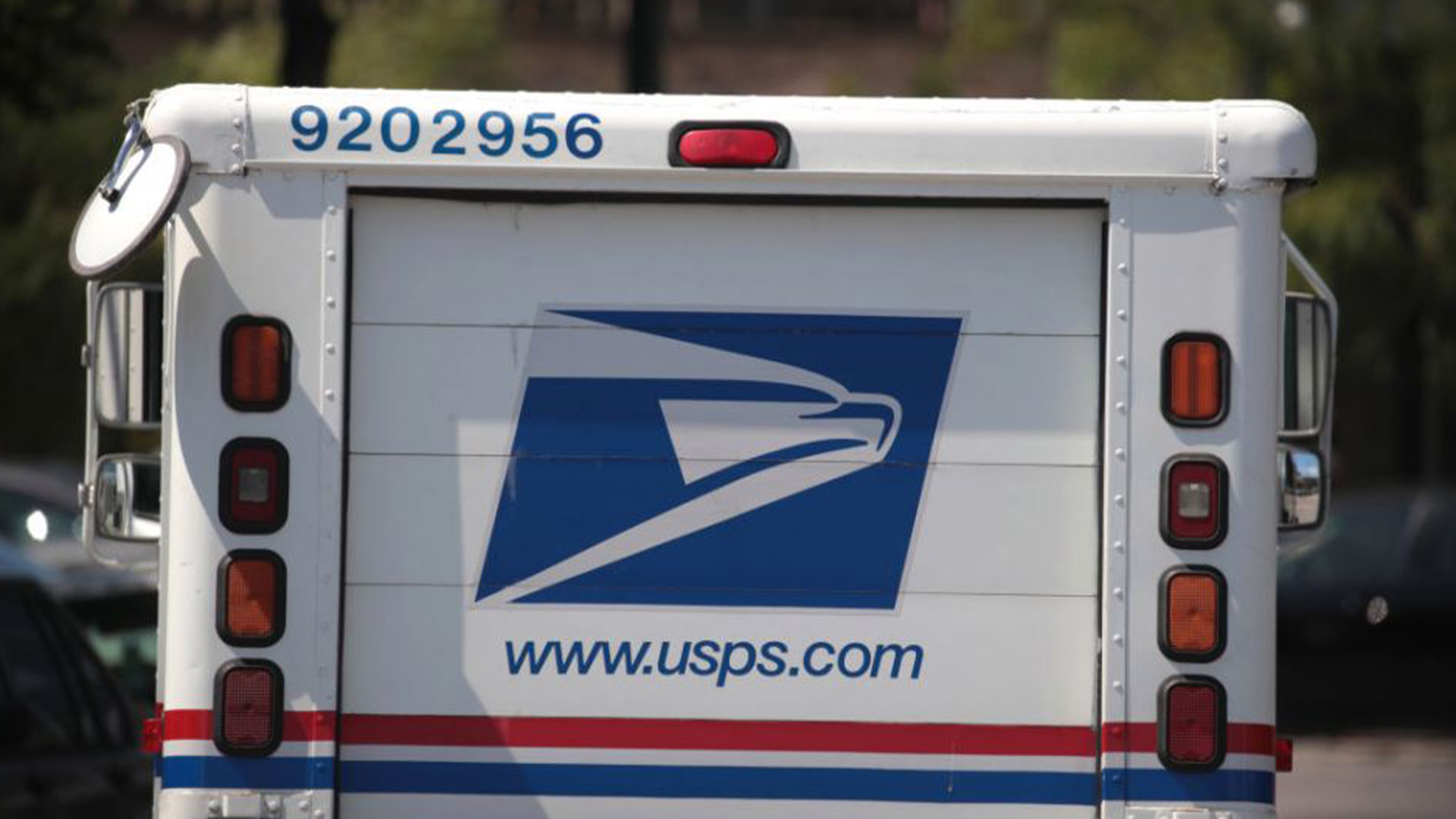 A postal worker leaves a United State Postal Service facility