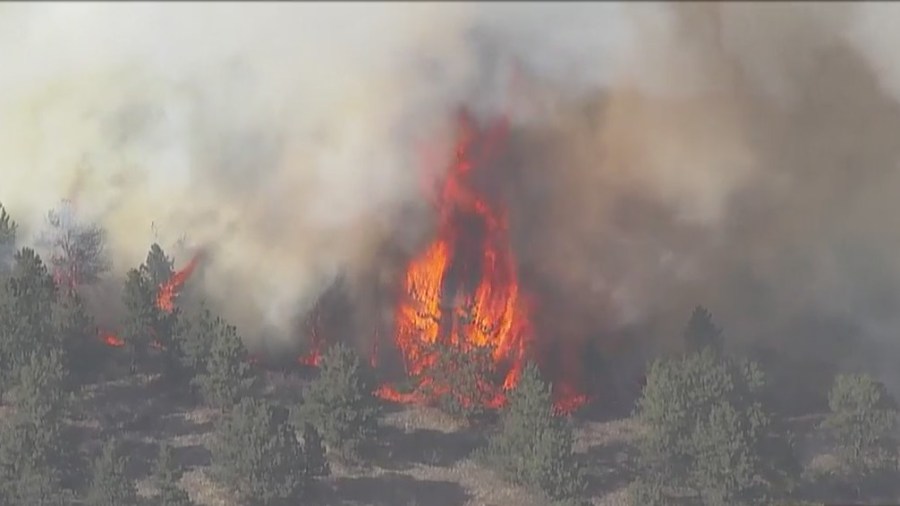 Flames can be seen from SkyFOX over a fire burning north of Lyons