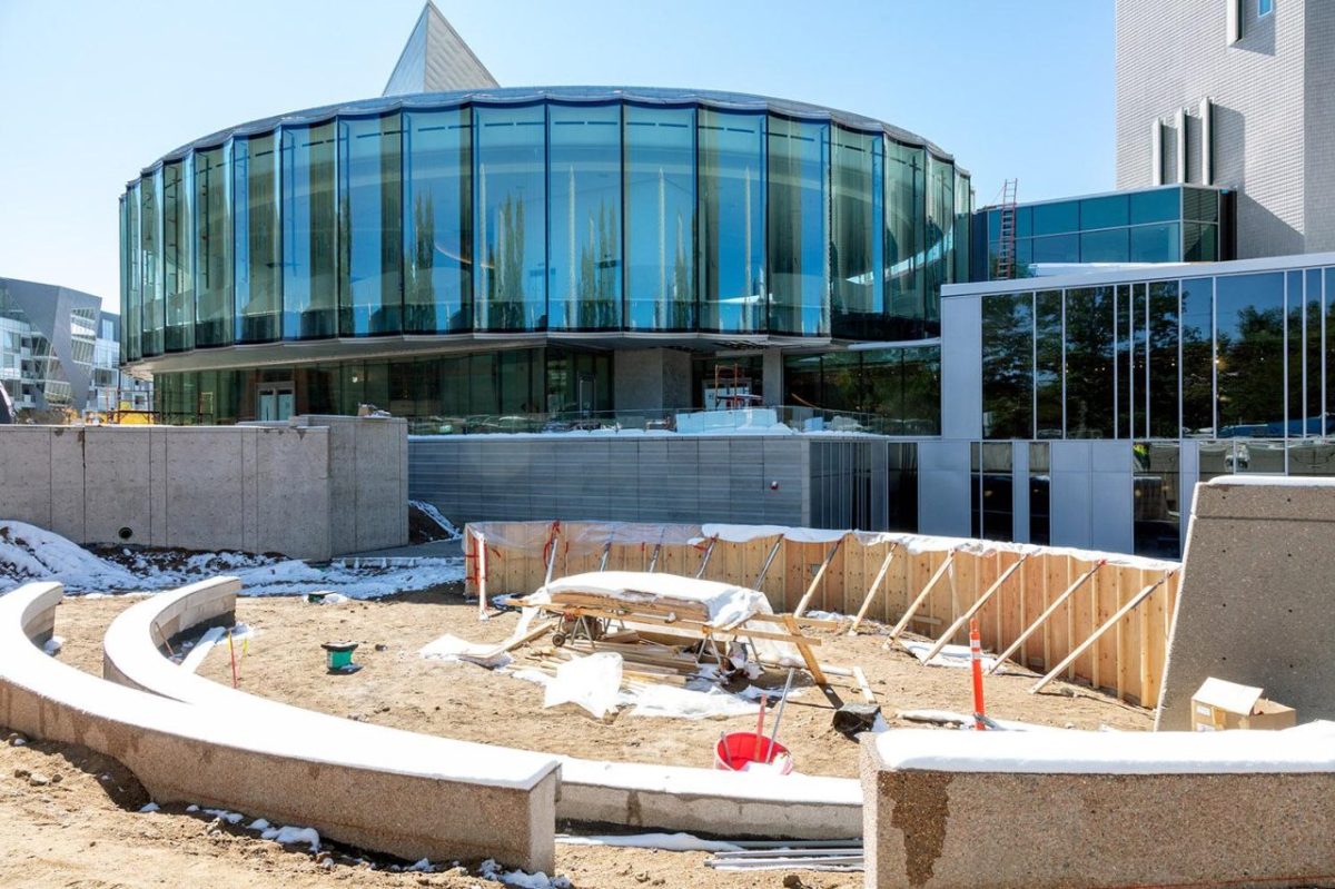 Exterior courtyard under construction, with Martin Building, Sie Welcome Center and Hamilton Building at the Denver Art Museum.