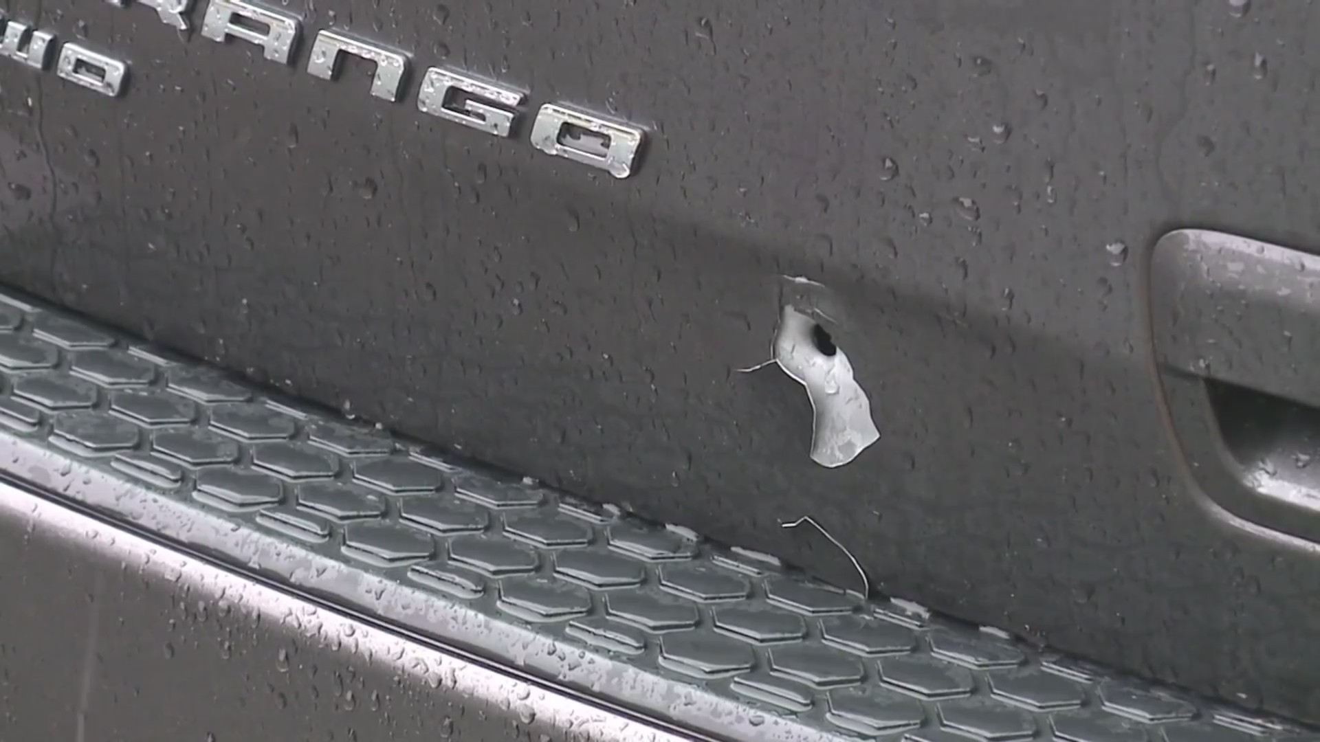 Bullet hole near rear hatch in Durango SUV