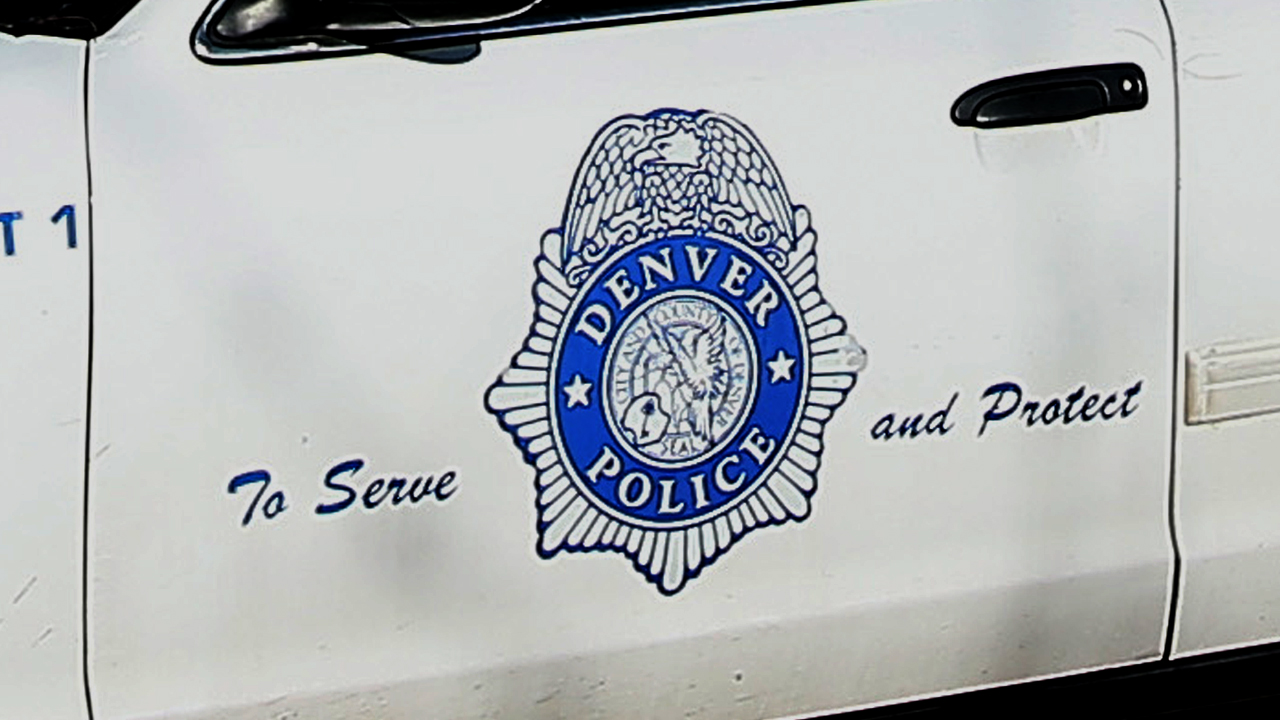 The Denver police badge is seen on the side of a department vehicle in this 2015 file photo.