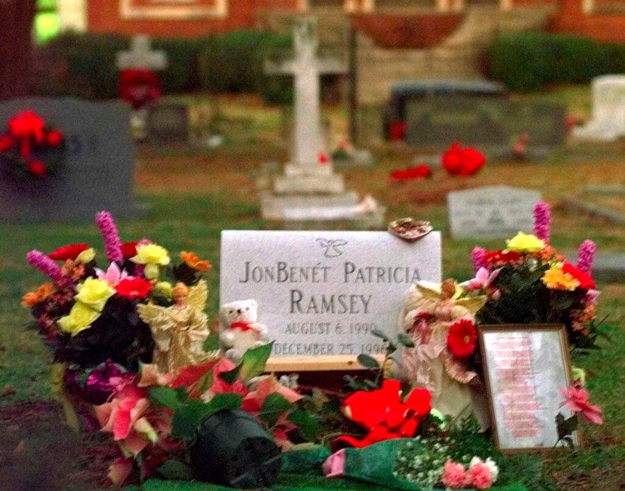 Flowers, pictures and stuffed animals adorn the gravesite of JonBenet Patricia Ramsey