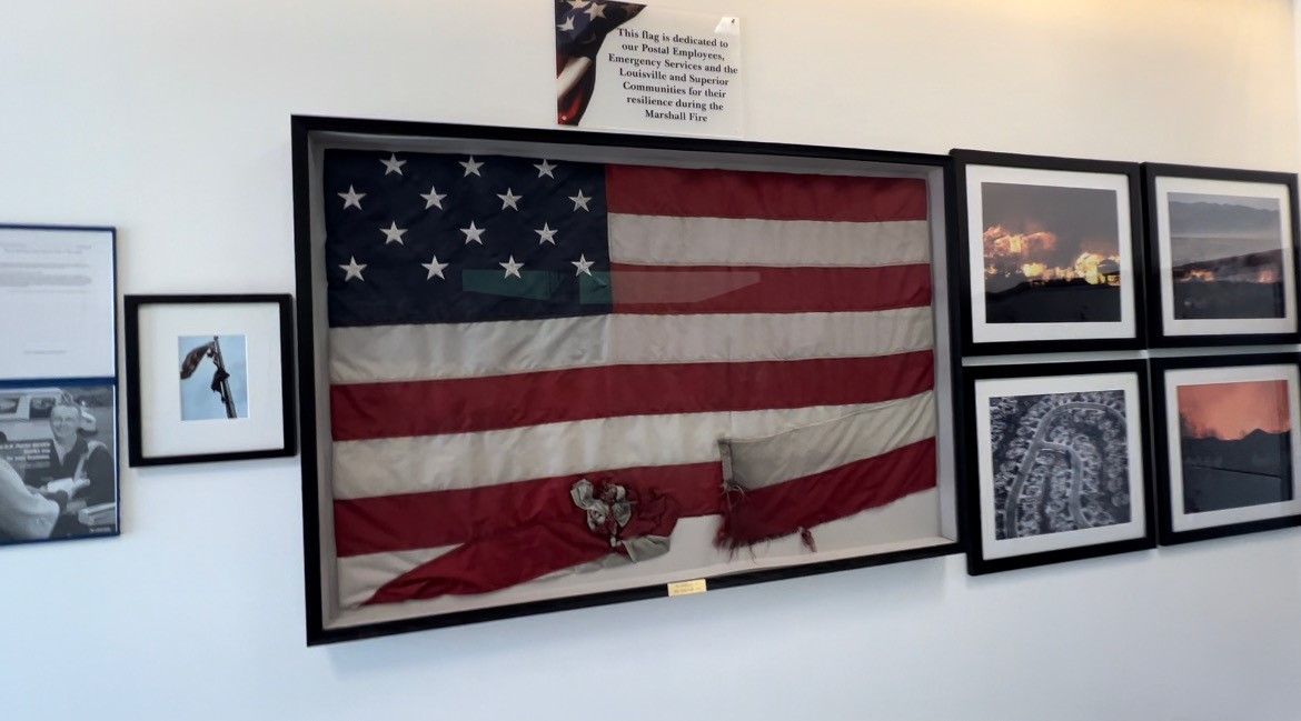 The Louisville Post Office unveiled the flag that survived the Marshall Fire