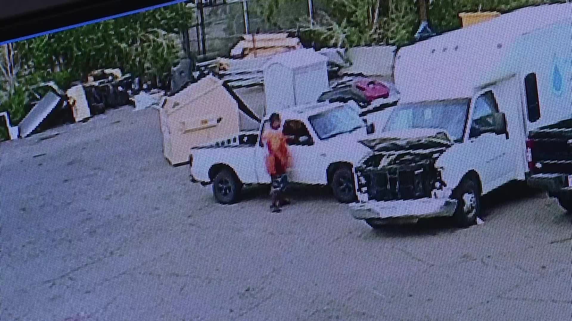 Surveillance video shows man stealing truck from body shop