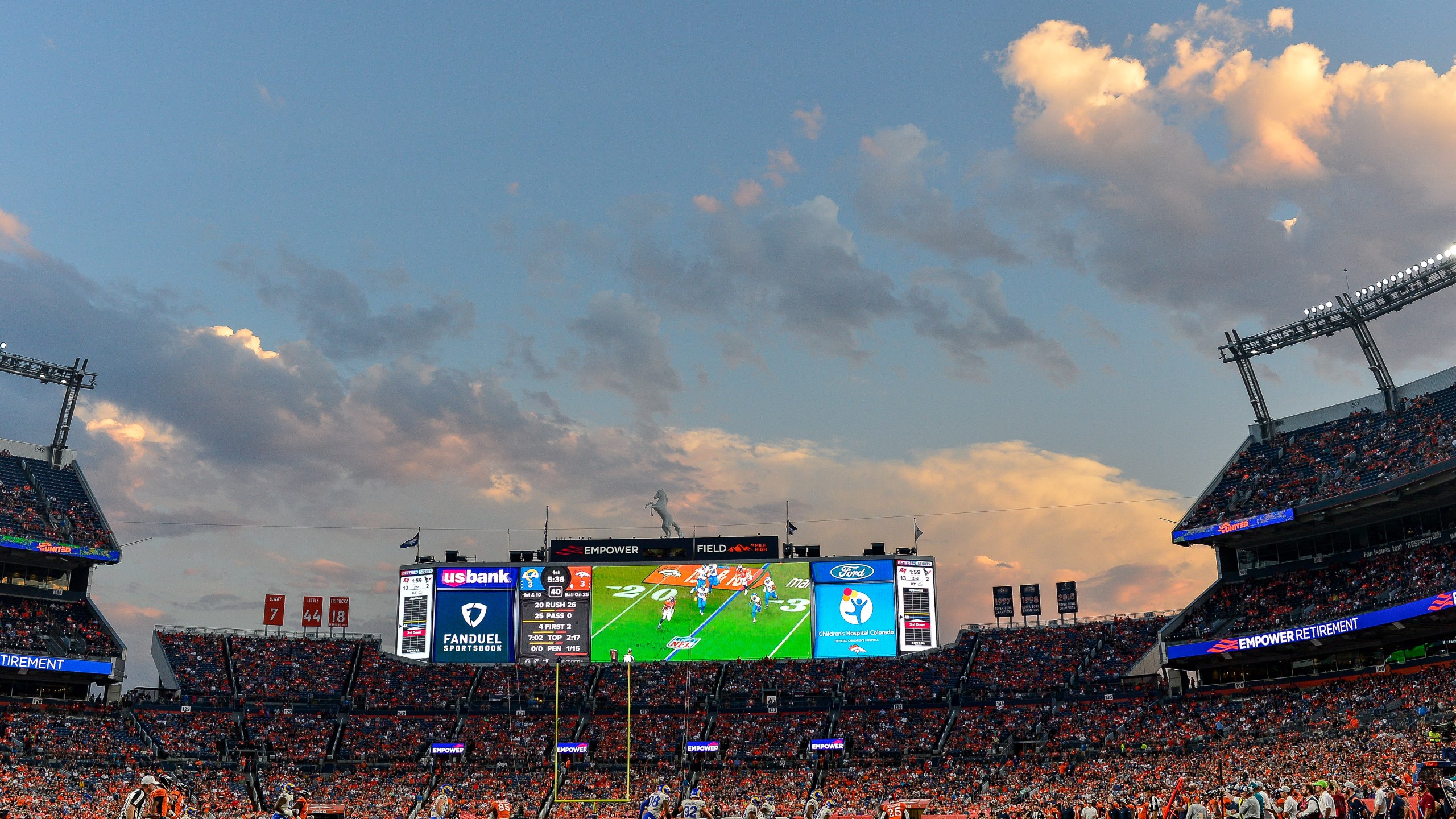 Inside Empower Field during evening Broncos game