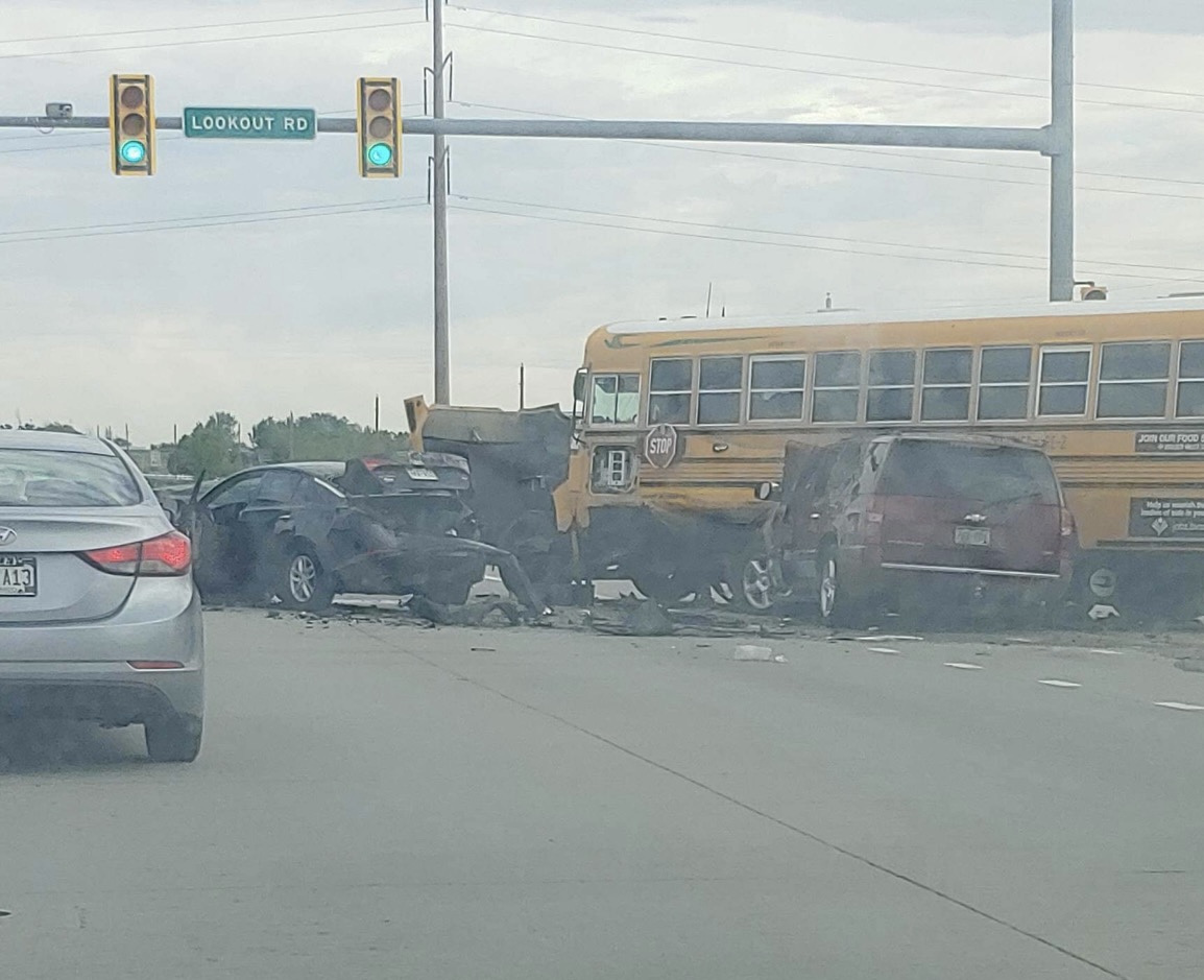 SUV crashes into school bus