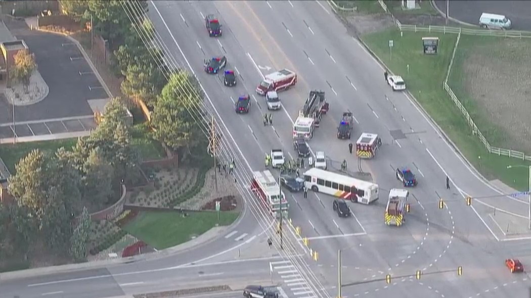 Emergency response crews at roadway intersection