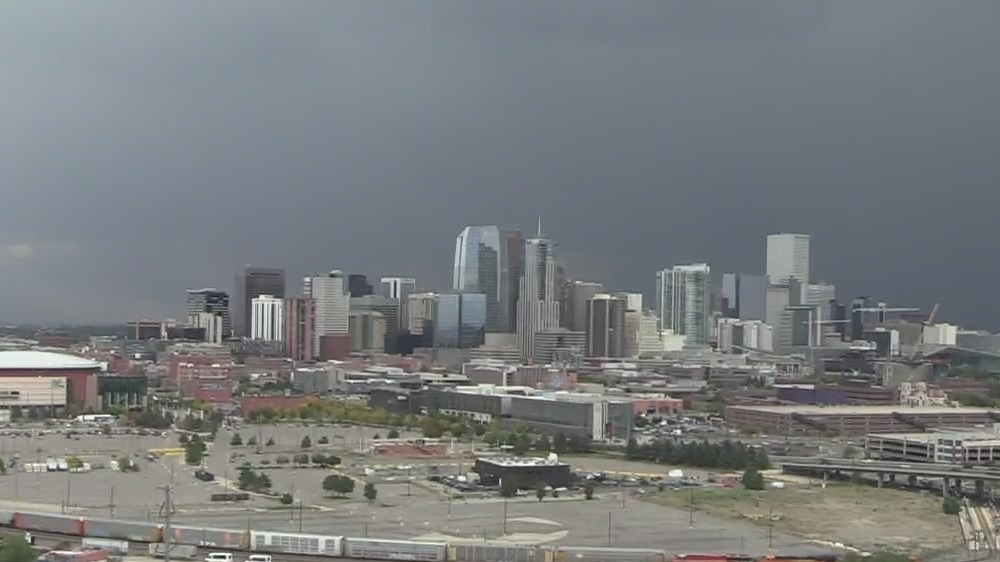 Storm clouds behind the Denver skyline