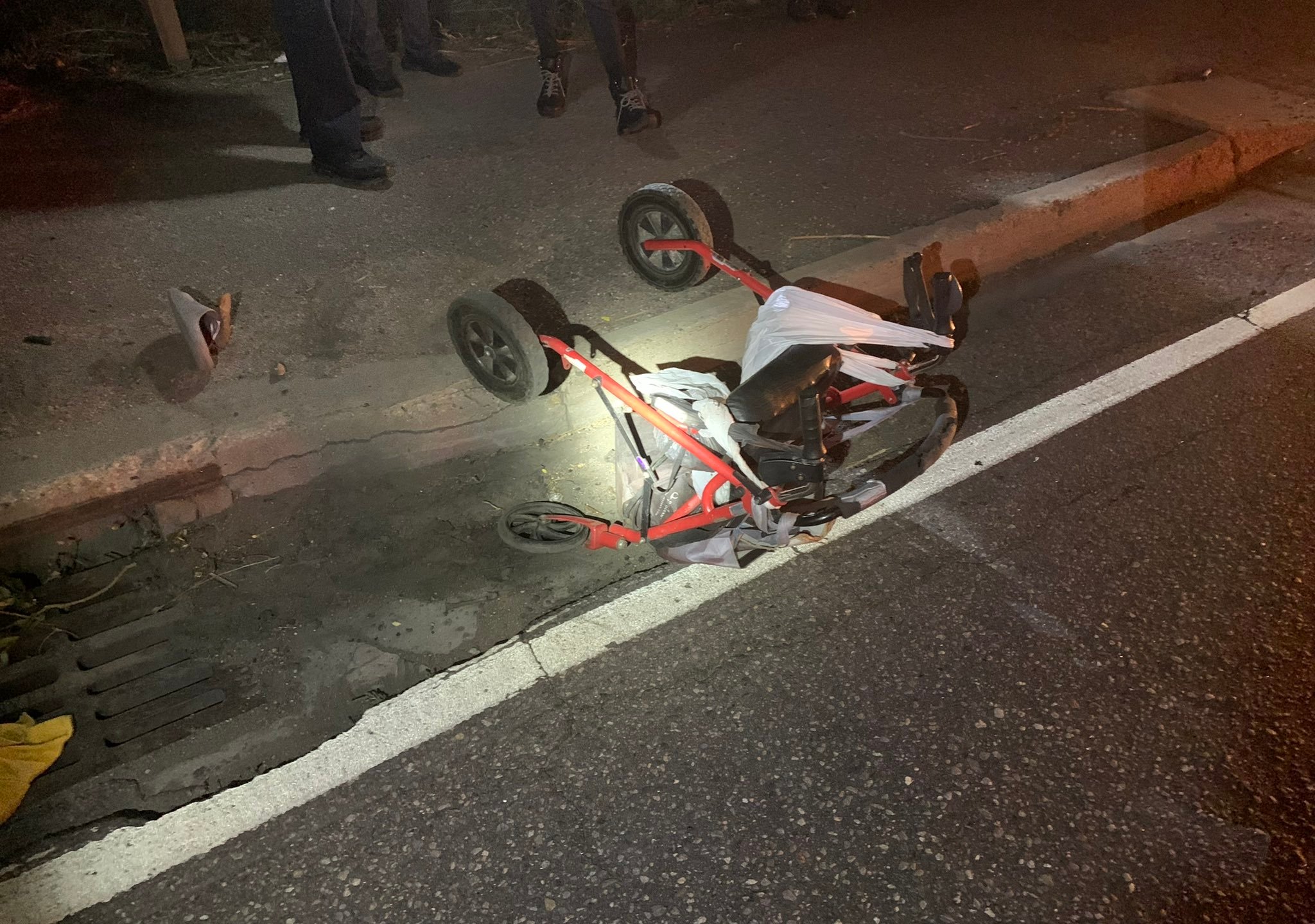 Walker on its side along a roadway