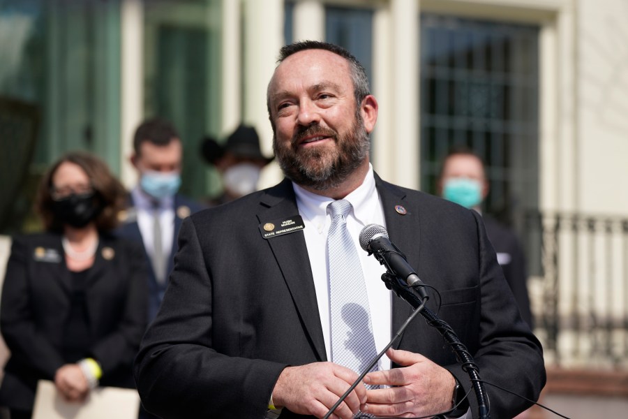 House Minority Leader Hugh McKean speaks during a news conference outside the Governor's mansion