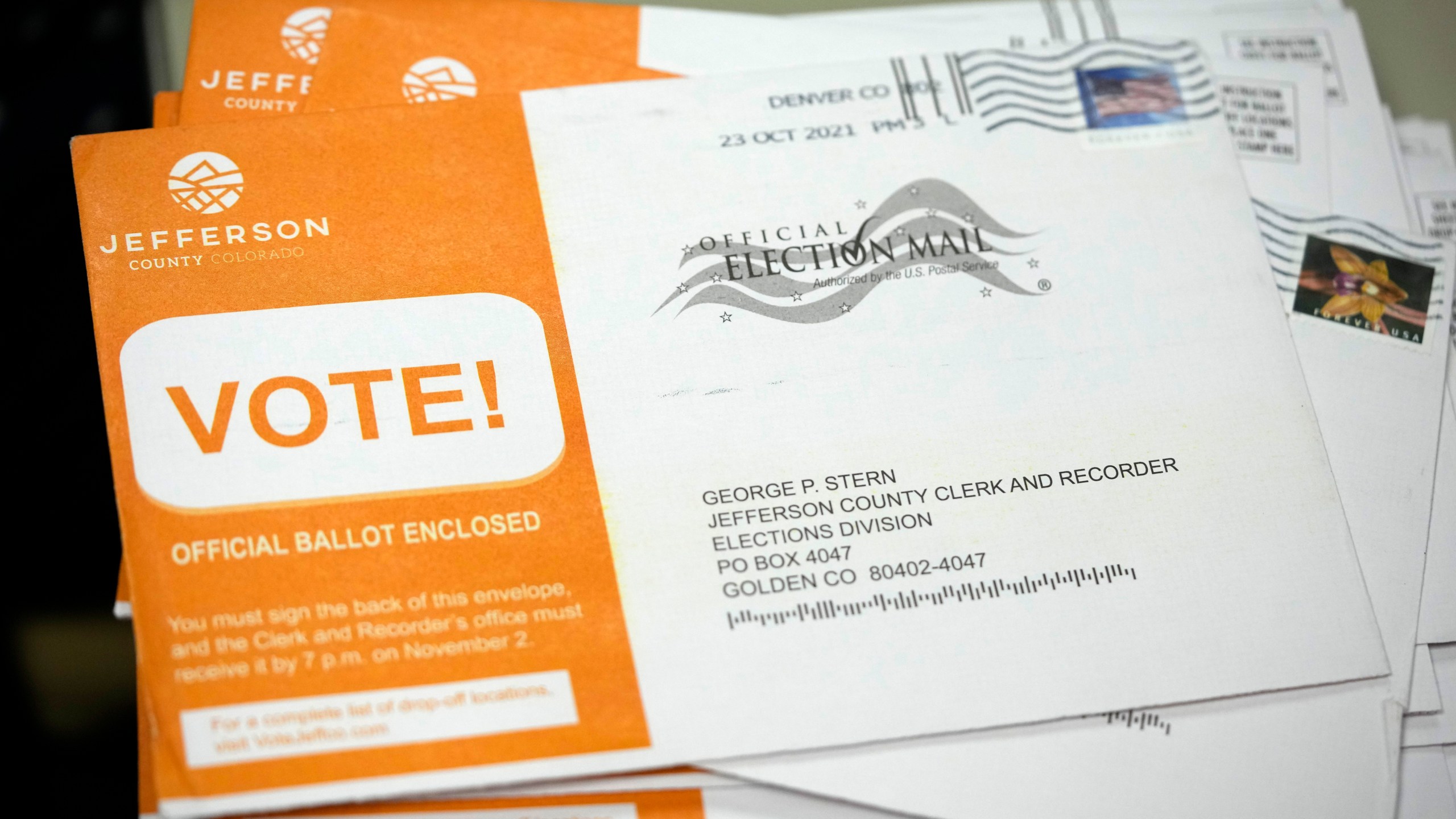 Stack of mail ballots in envelopes