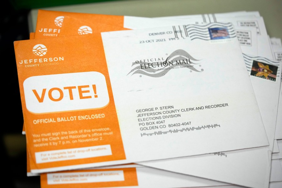 Stack of mail ballots in envelopes