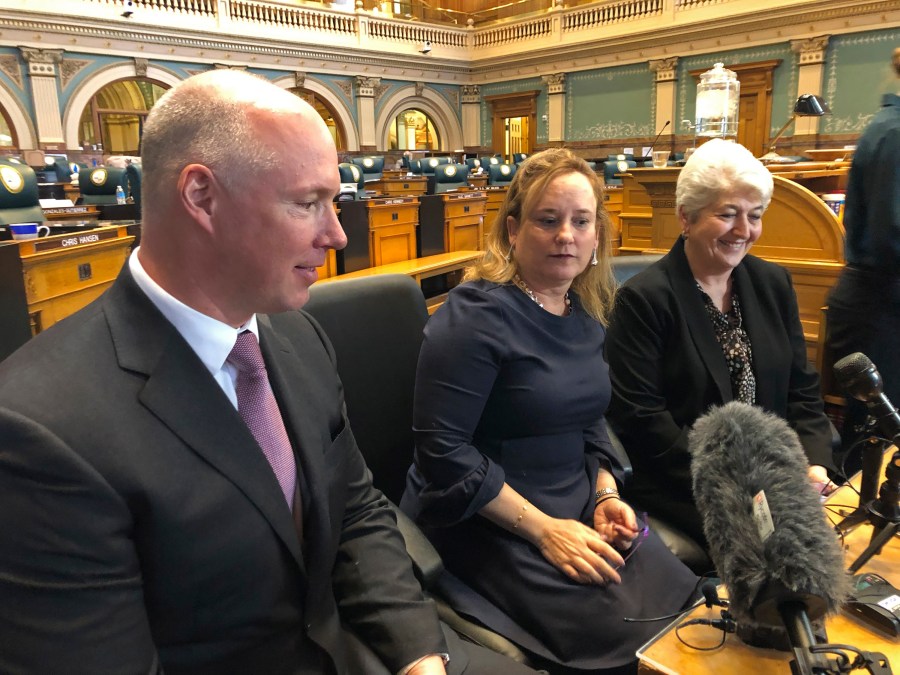 Colorado Republican Sen. Kevin Priola, left, Democratic House Speaker KC Becker, center, and Democratic Sen. Lois Court inside the Colorado Capitol