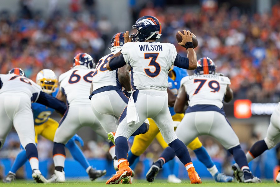 Russell Wilson (3) passes the ball