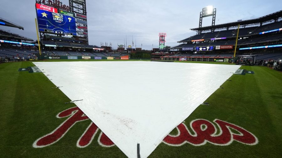 The field is covered with the threat of rain before Game 3 of baseball's World Series between the Houston Astros and the Philadelphia Phillies on Monday, Oct. 31, 2022, in Philadelphia.