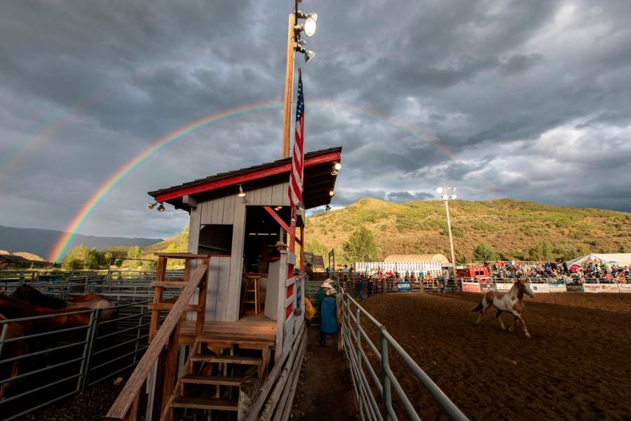 A rainbow appears over the rodeo grounds at the Snowmass Rodeo