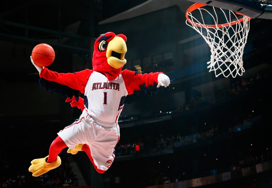 Harry the Hawk, mascot of the Atlanta Hawks, dunks during a timeout