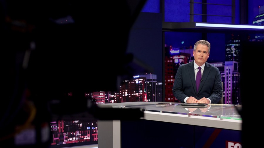 FOX31 anchor Jeremy Hubbard at the anchor desk on KDVR's new set.