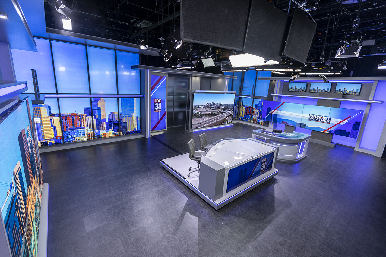 A wide view of the news desk on FOX31's new set.