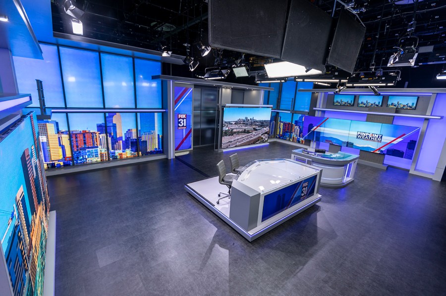 A wide view of the news desk on FOX31's new set.