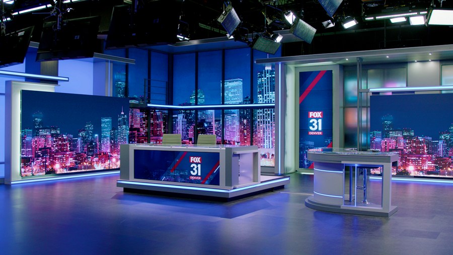 The news and weather desks are seen on FOX31's new set.