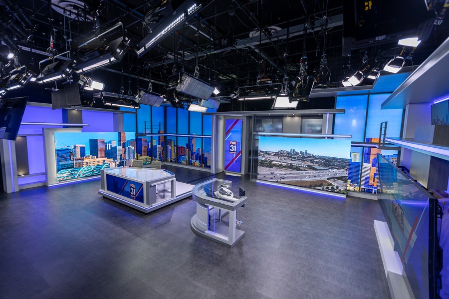 A wide view of the news desk from the weather area on FOX31's new set.