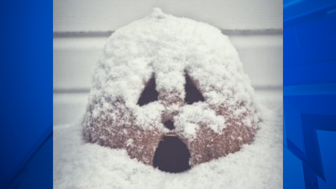 Screaming Jack O Lantern Covered in Snow