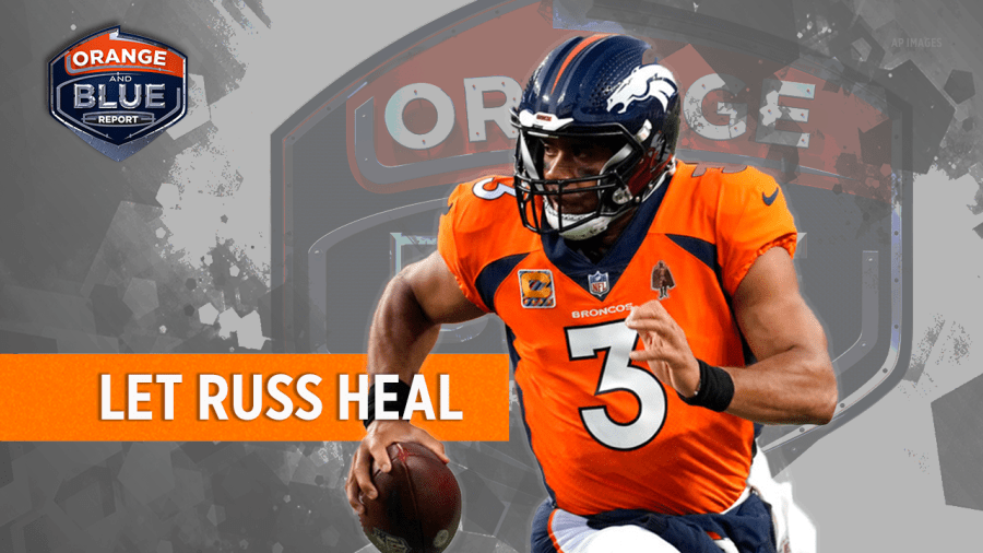 Russell Wilson with text that says "LET RUSS HEAL"