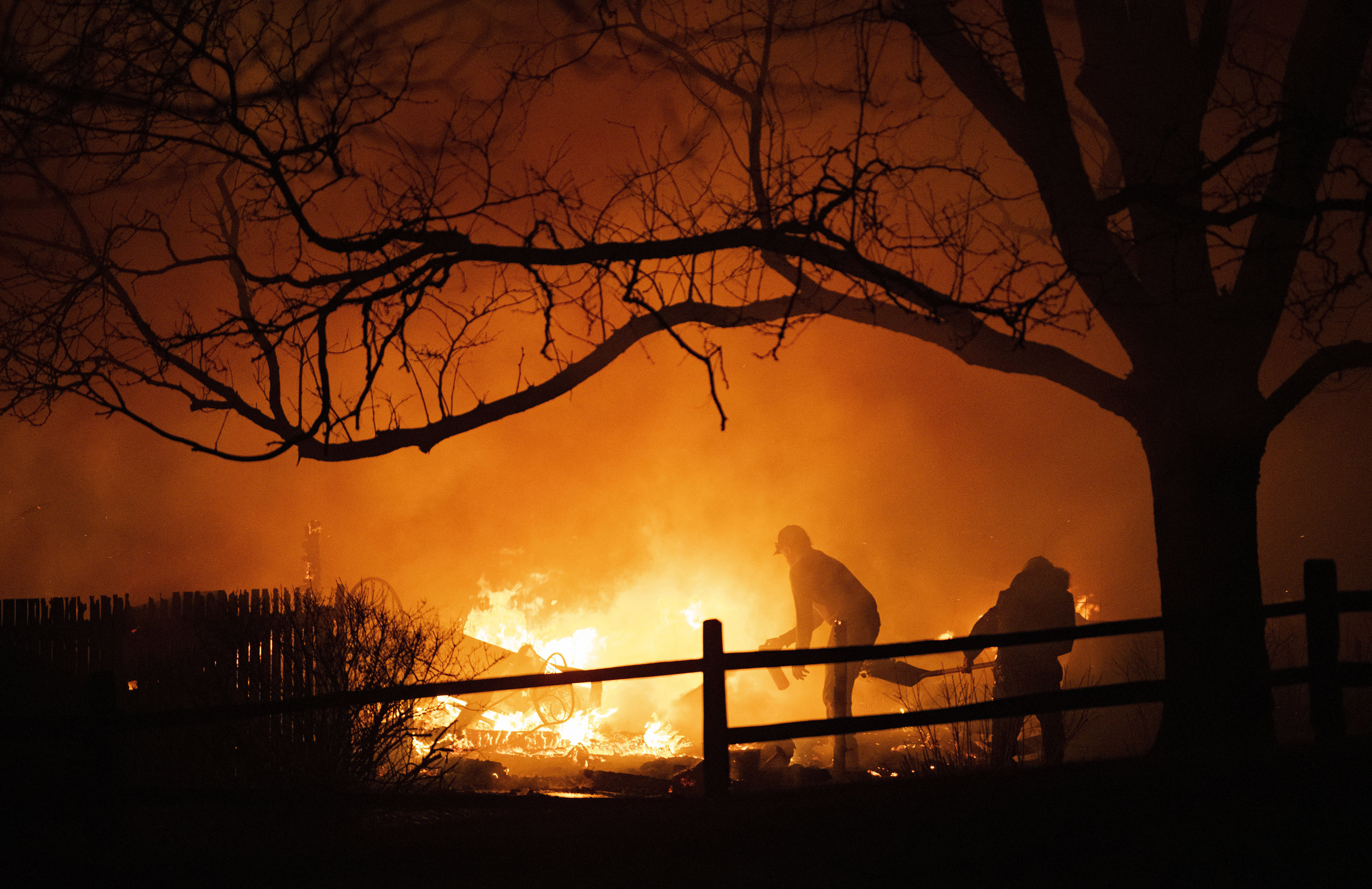 Residents fight the Marshall Fire in Louisville, Colo.