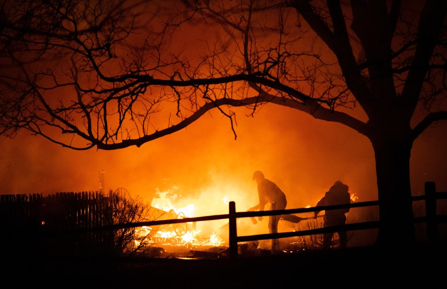 Residents fight the Marshall Fire in Louisville, Colo.