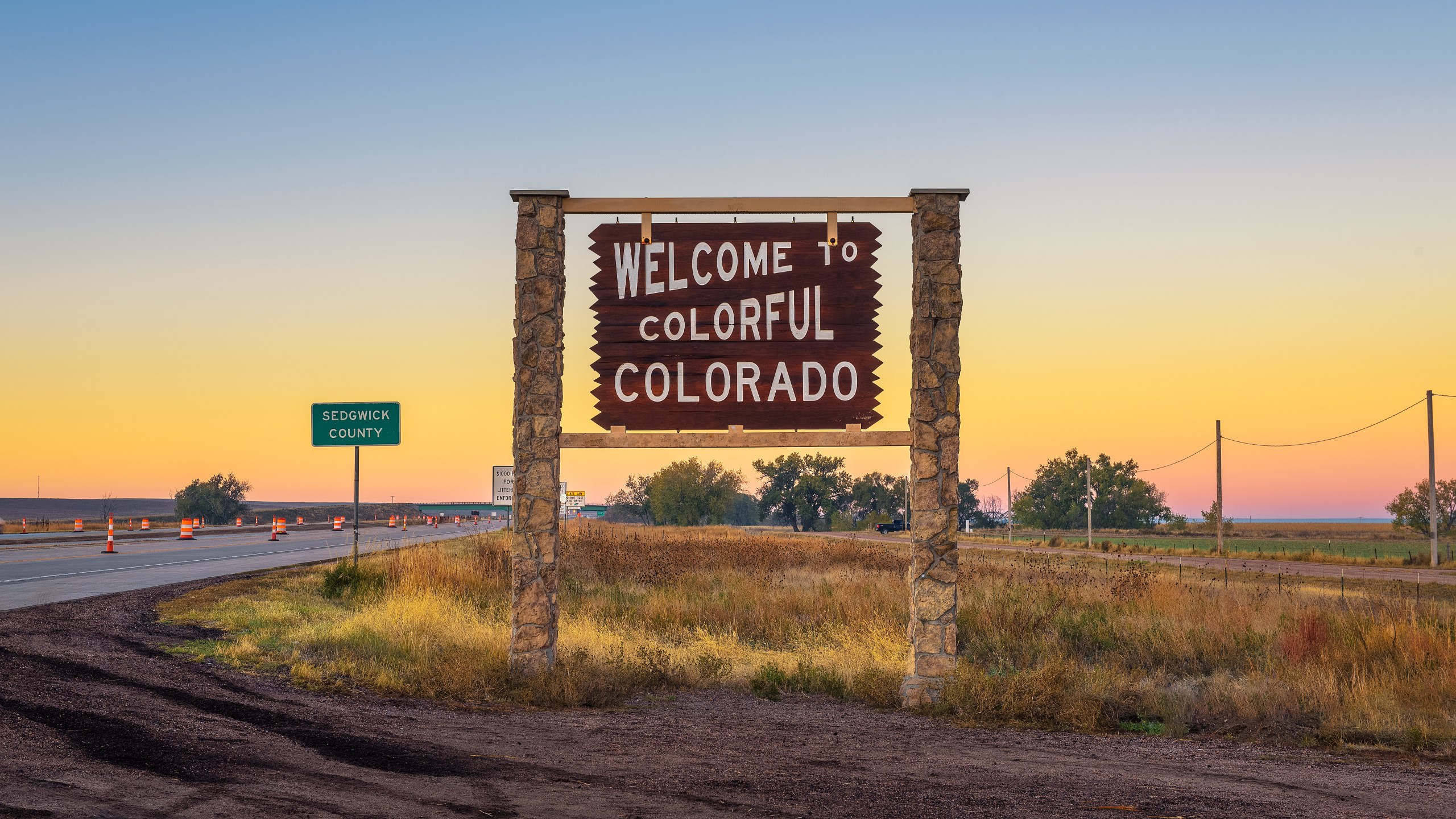 Welcome to colorful Colorado street sign along Interstate I-76