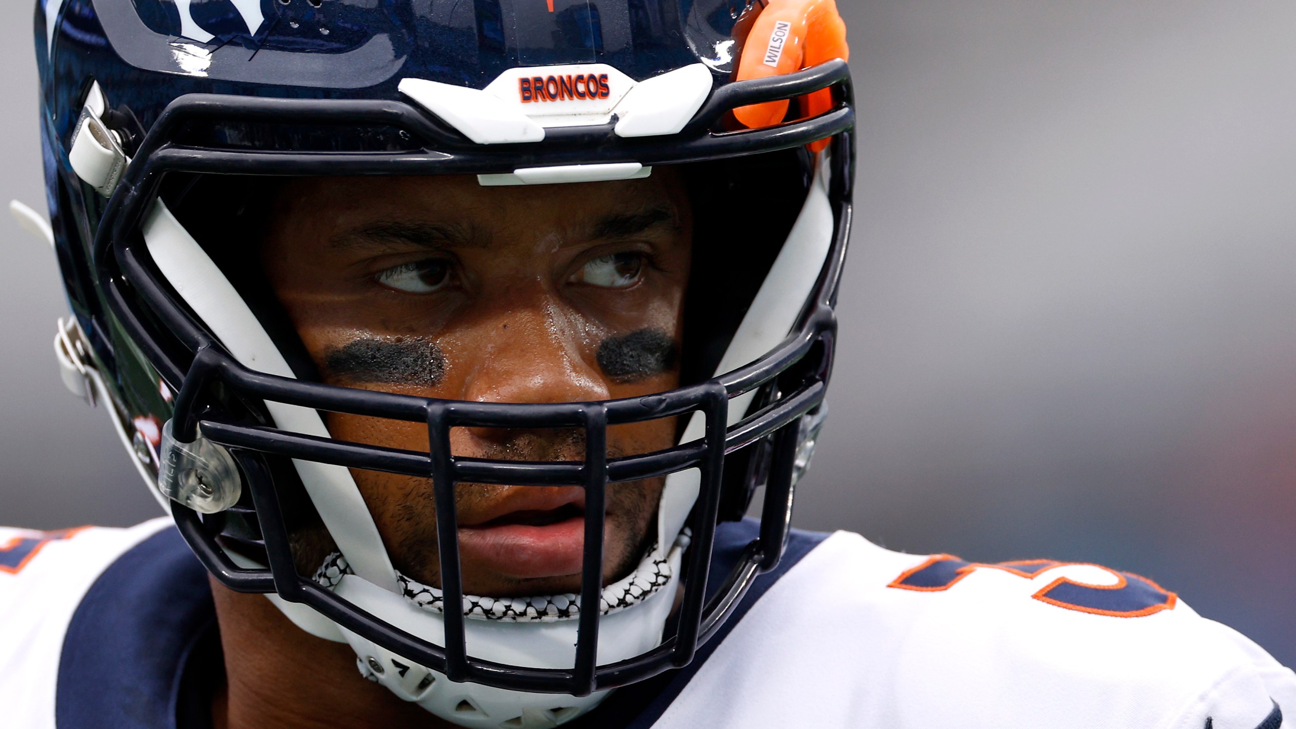 Russell Wilson #3 of the Denver Broncos looks on before the game