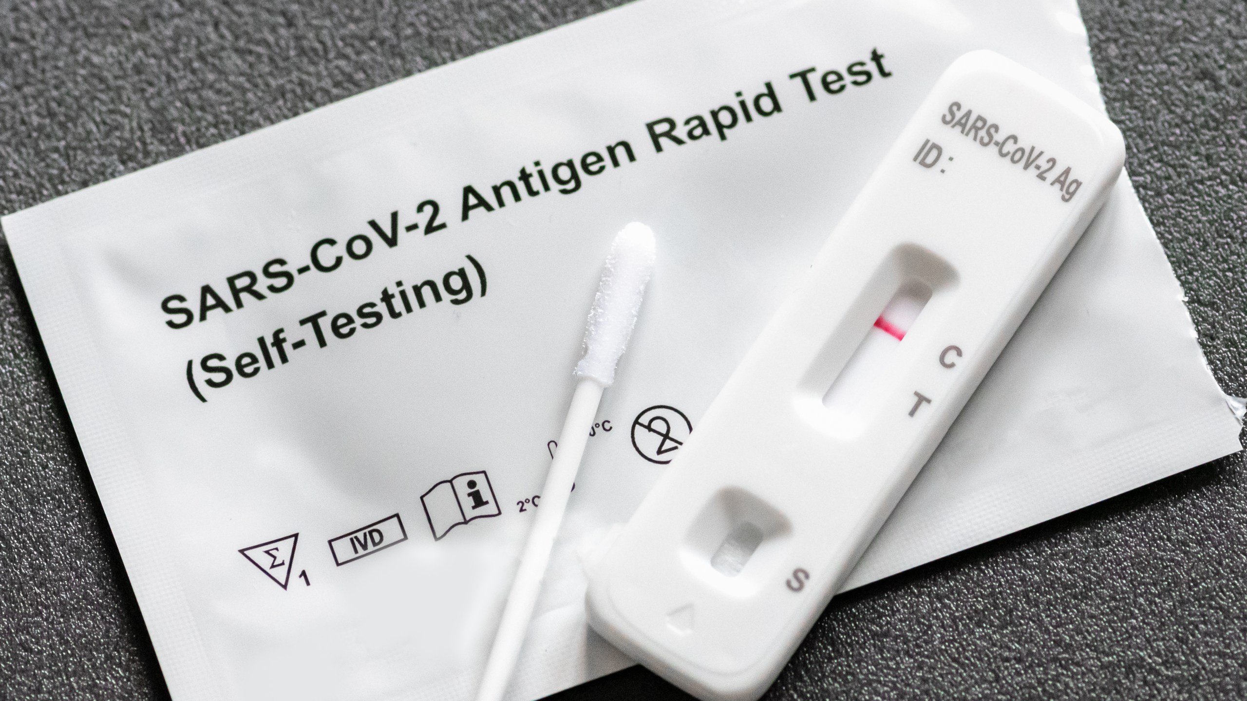 A used at-home rapid COVID-19 test displays a negative result.