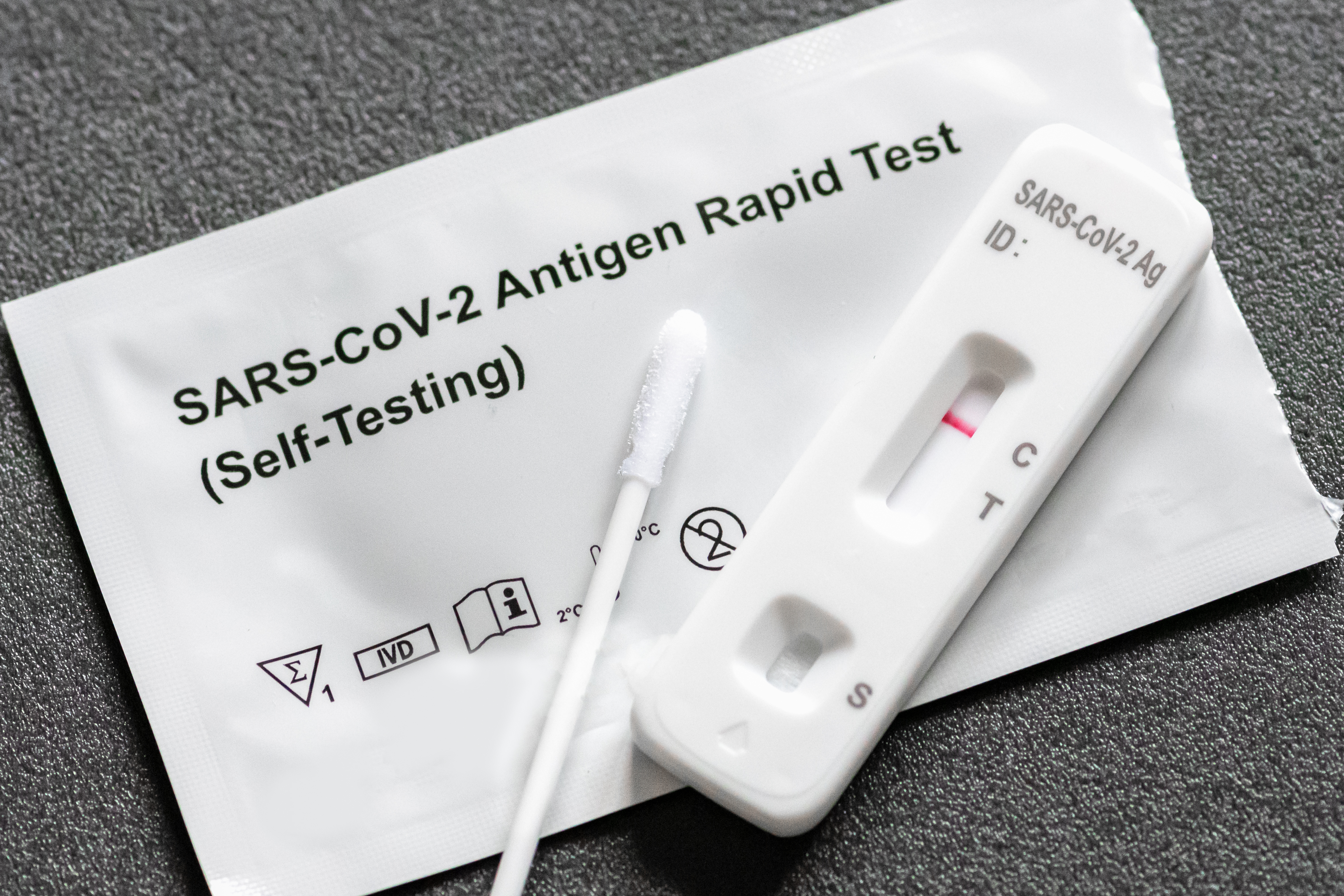 A used at-home rapid COVID-19 test displays a negative result.