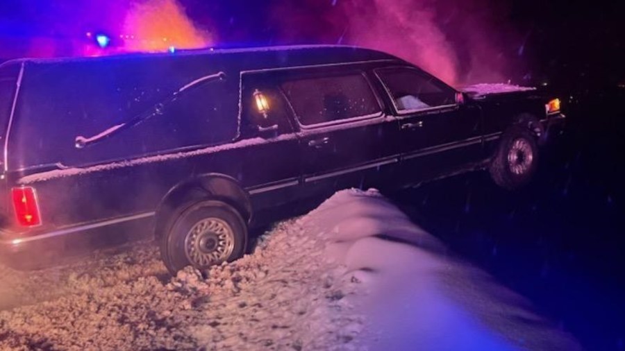 Hearse slids off Interstate 70