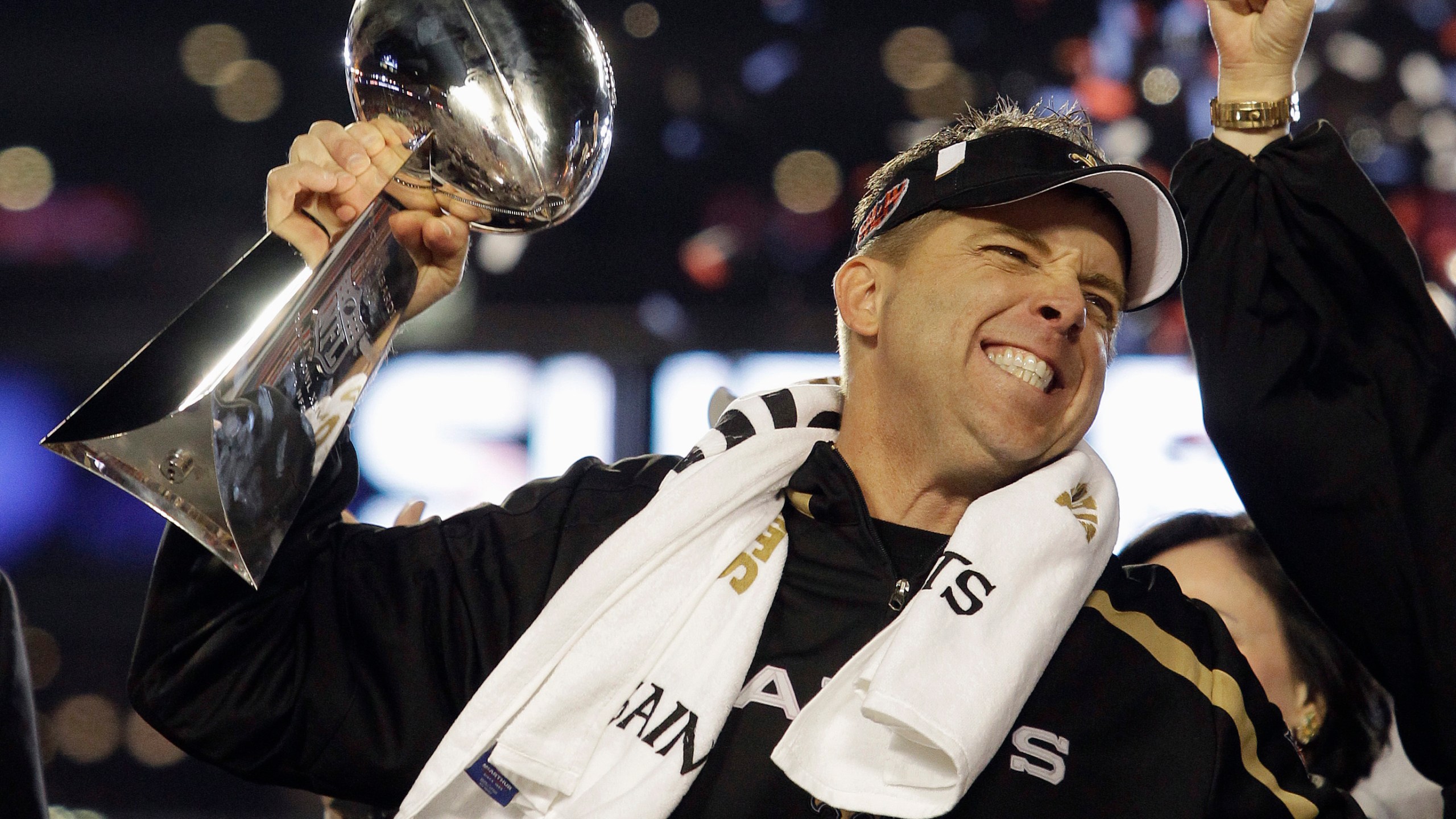 New Orleans Saints head coach Sean Payton celebrates with the Vince Lombardi Trophy