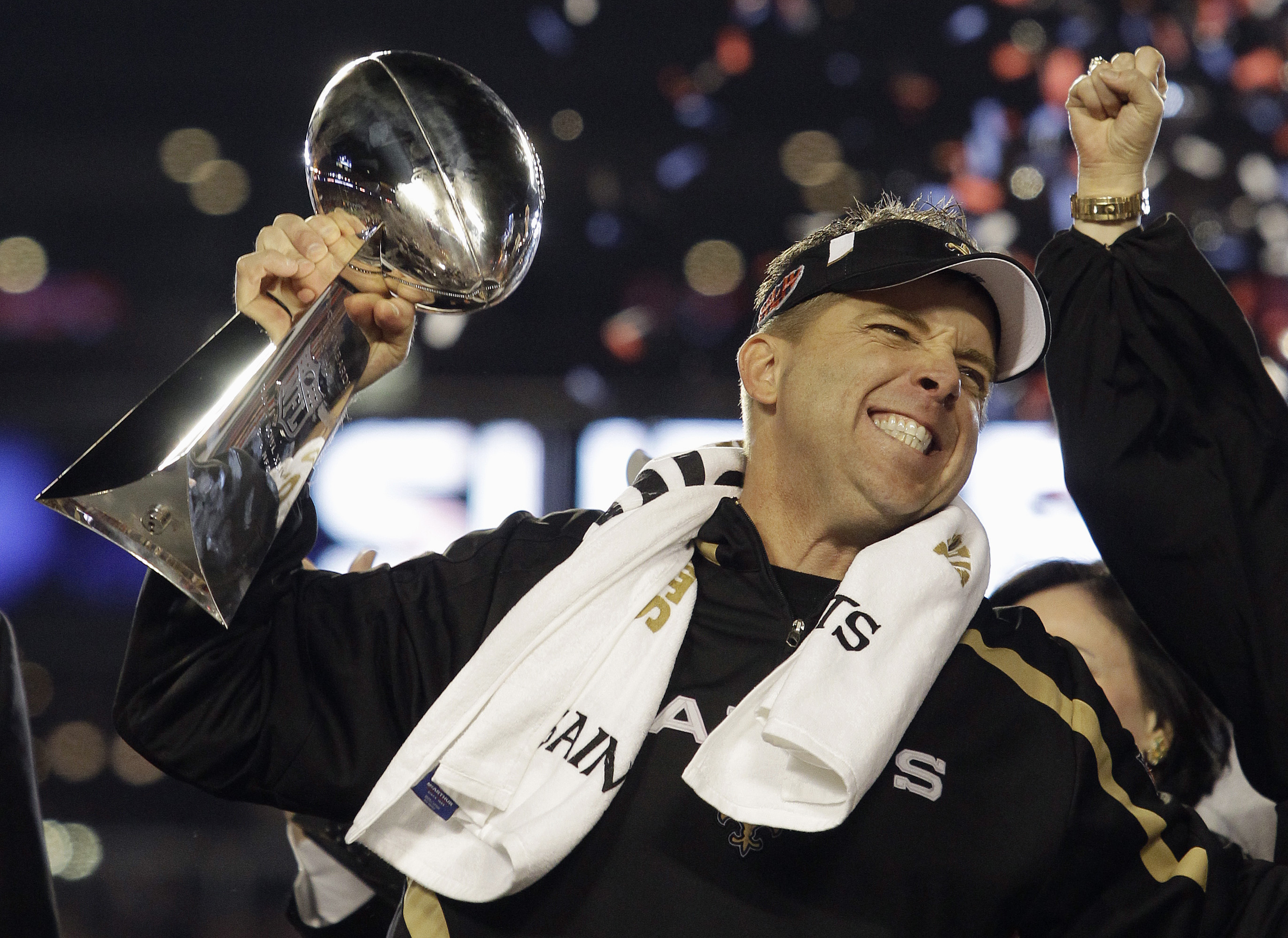 New Orleans Saints head coach Sean Payton celebrates with the Vince Lombardi Trophy