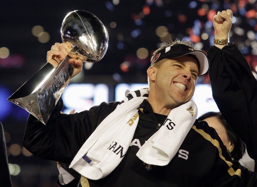 New Orleans Saints head coach Sean Payton celebrates with the Vince Lombardi Trophy