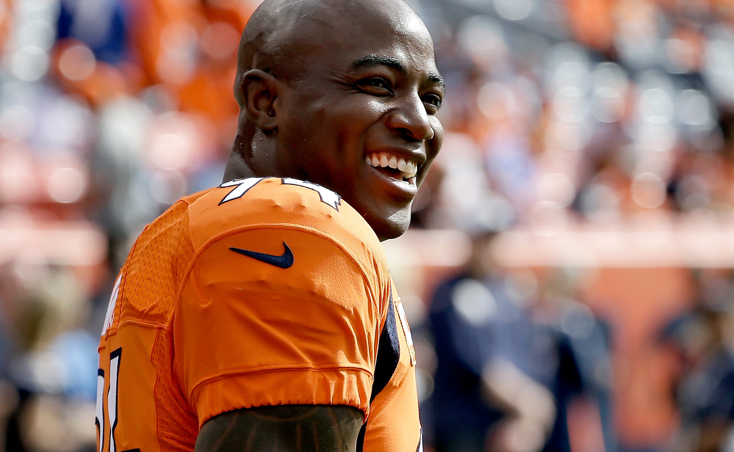 Denver Broncos outside linebacker DeMarcus Ware (94) smiling