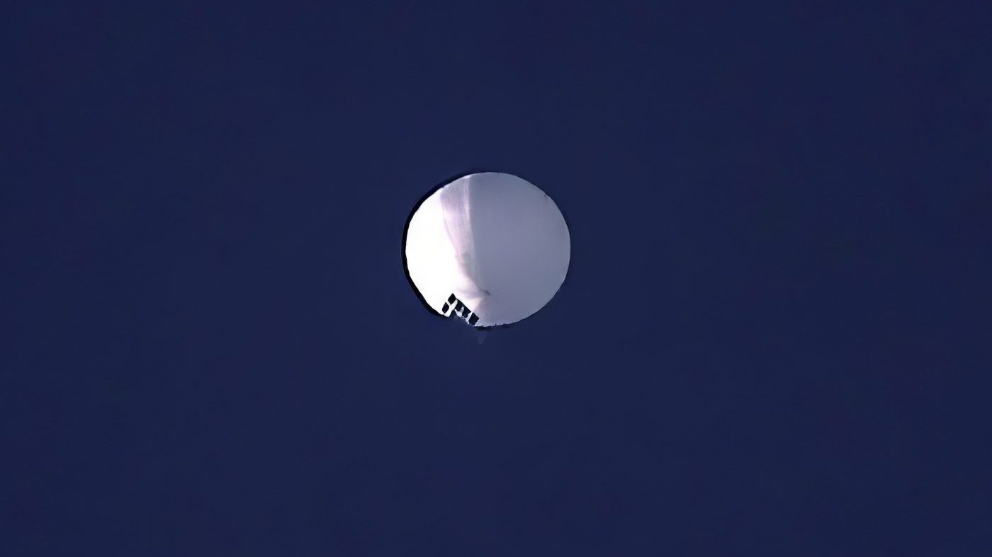 A high altitude balloon floats in the sky