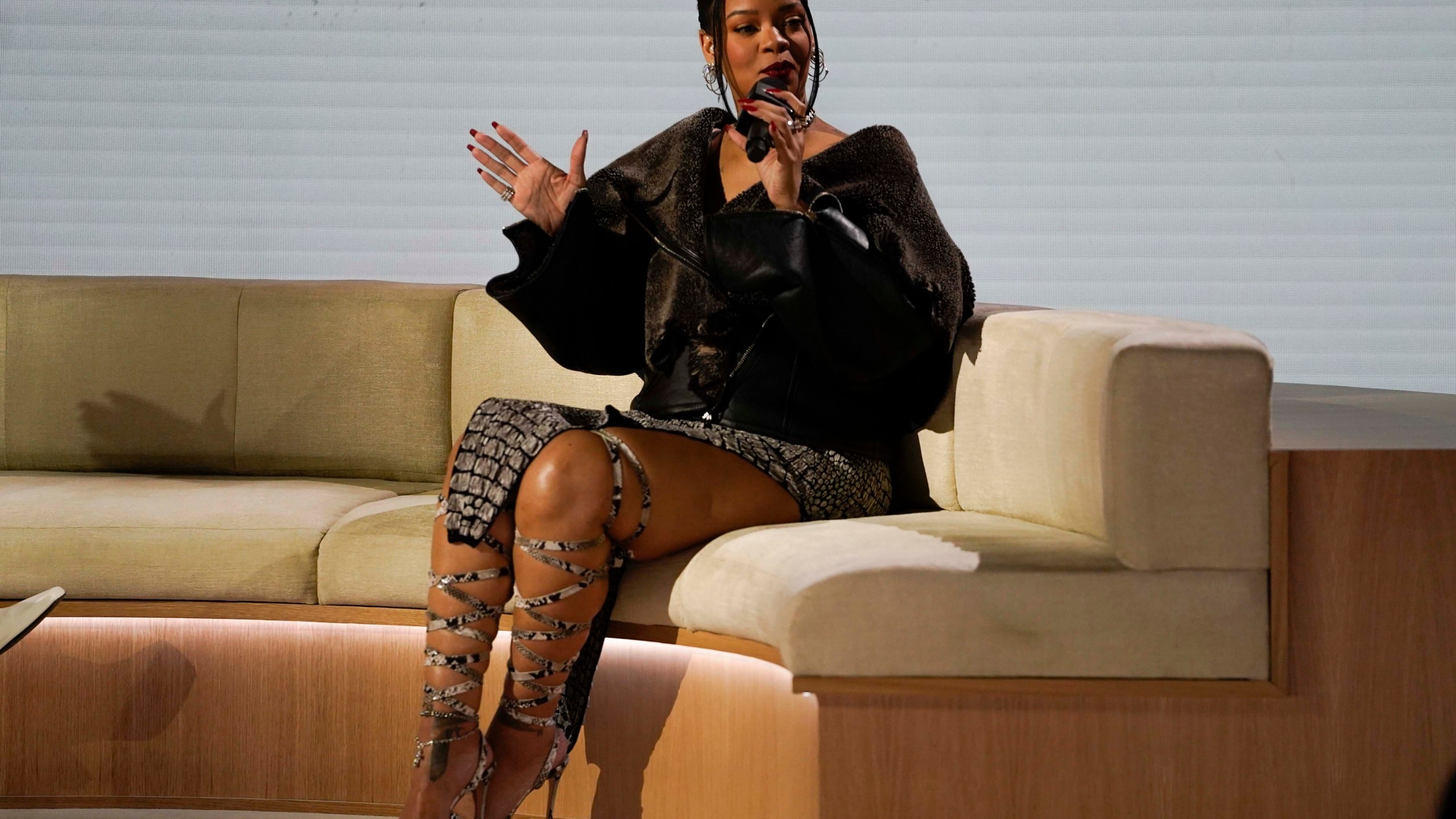 Rihanna speaks during a halftime show news conference