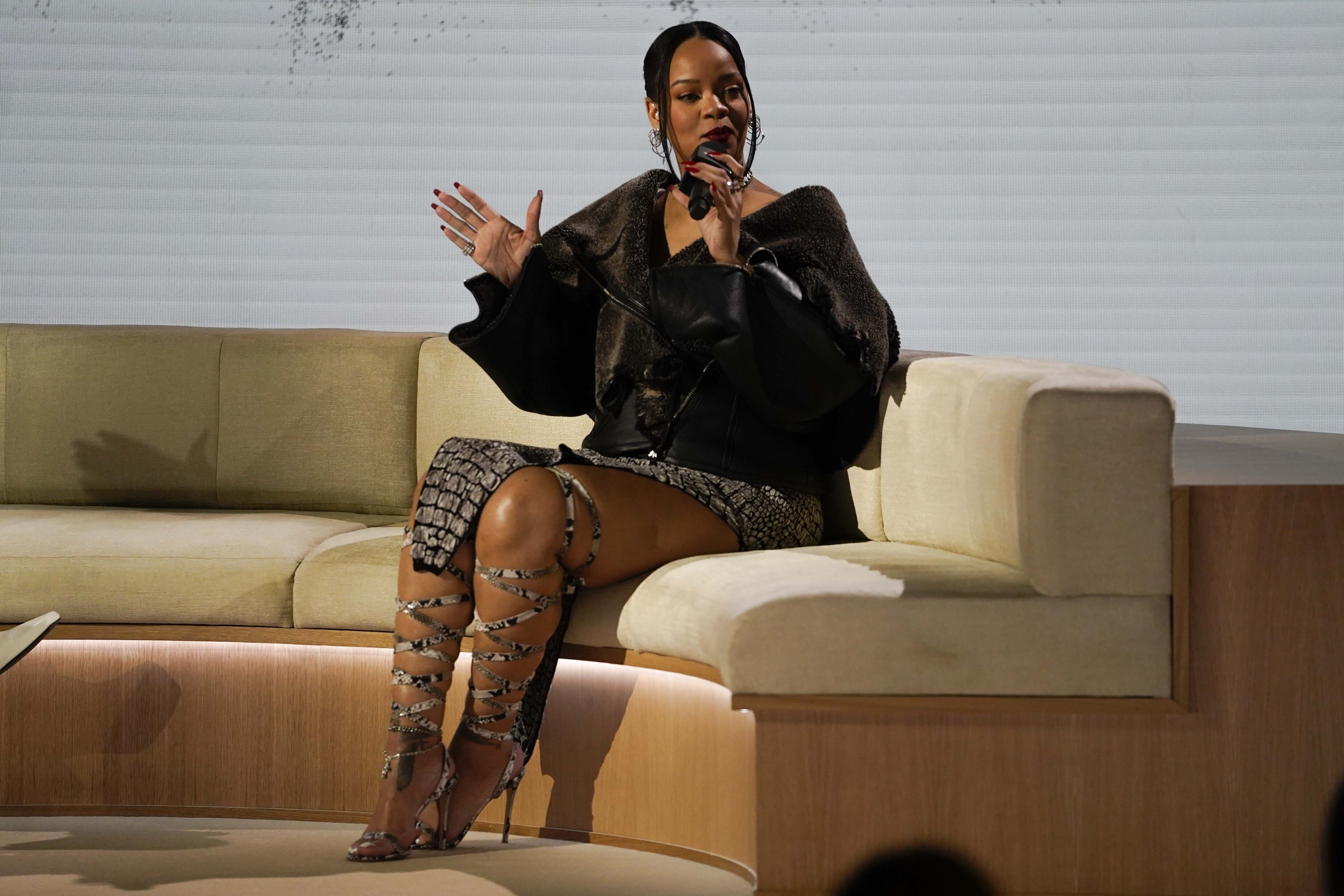 Rihanna speaks during a halftime show news conference