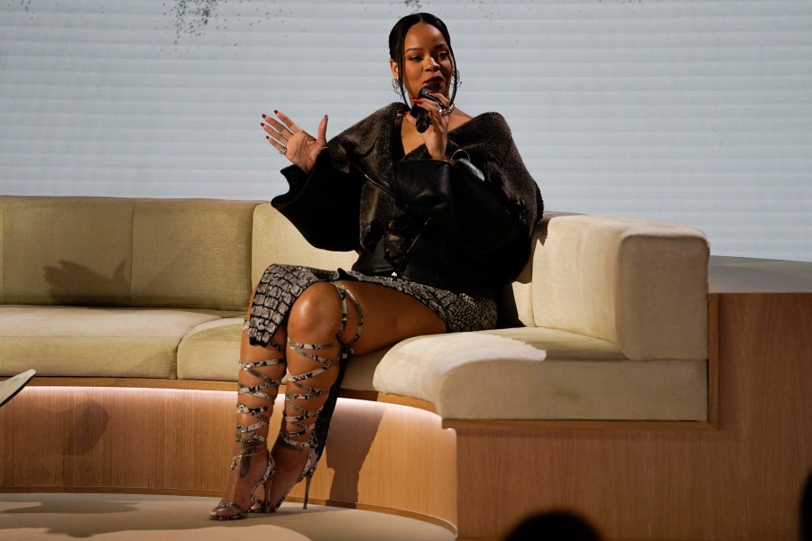 Rihanna speaks during a halftime show news conference