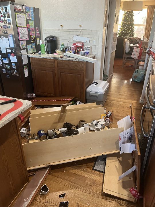 Smashed mugs after a cabinet fell inside a Morrison home on Super Bowl Sunday. 