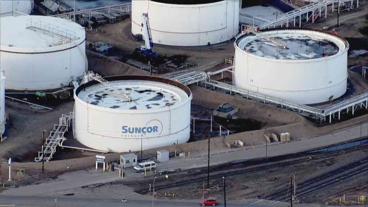 Aerial view of large vessels at Suncor's facility in Commerce City